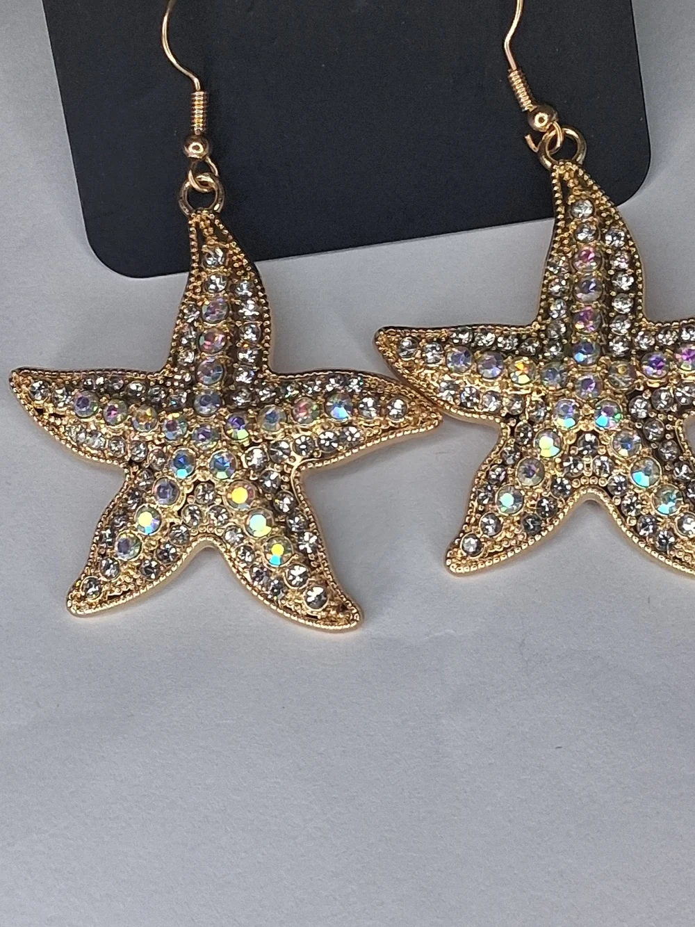 Gold Starfish Earrings with Iridescent Crystals